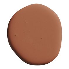 a round brown substance on a white background