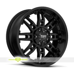 a black wheel on a white background with the word tuff written in it's center