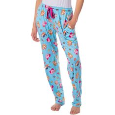 Embrace comfort and style with our Kirby Women's Pajama Pant. Sporting an all-over print design, these playful pajama pants pay homage to the Kirby, your beloved character from the world-renowned video games. Each sleep pant is made of an ultra-soft 92% polyester, 8% spandex that will make you long to slide the pajamas on daily! The pants have two hand-deep pockets, a button-closure fly, and a drawstring closure with an elastic stretch waistband. Printed Cotton Bottoms For Pajama Party, Cotton Printed Bottoms For Pajama Party, Printed Blue Bottoms For Loungewear, Blue Printed Bottoms For Loungewear, Blue Printed Loungewear Bottoms, Blue Bottoms With Elastic Waistband For Sleepover, Blue Relaxed Fit Bedtime Bottoms, Blue Relaxed Fit Bottoms For Bedtime, Playful Blue Pants With Pockets