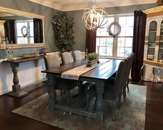 the dining room table is surrounded by chairs