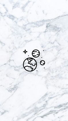 an image of the earth with stars and moon drawn on it's marble surface