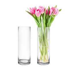 two vases with pink flowers in them on a white background, one is empty and the other has green stems