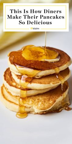 pancakes stacked on top of each other with syrup being drizzled over them