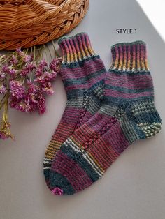 Made in care and quality in mind by me. Hand-knitted colorful pattern socks for cold days! Made with sock yarn- they are soft and durable! Made of: 75% wool 25% polyimide   STYLE 1 - size S STYLE 2 - size S Let me know if you are interested in other sizes!  *The price is set for 1 pair.* CARE INSTRUCTIONS: -Hand wash in 30o -Don't use too much detergent -Don't let the garment soak -Don't use fabric softener -Gentle agitation only. Rinse water with special care as the fabric can stretch out of sh Comfortable Multicolor Socks As Gift, Comfortable Multicolor Socks For Gifts, Warm Multicolor Socks For Winter, Casual Pink Knitted Socks, Colorful Casual Winter Socks, Casual Colorful Winter Socks, Warm Multicolor Winter Socks, Handmade Green Socks For Winter, Casual Multicolor Handmade Knitting Pattern