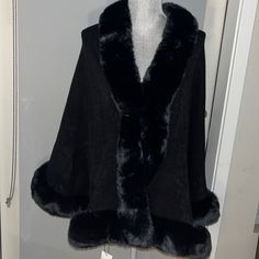 Never Worn , New With Tags Ellian Brand , Elegant Cape With Faux Fur Boarder All Around The Edge. Body Acrylic Material, Black Color Elegant Black Outerwear With Faux Fur Trim, Elegant Black Outerwear With Faux Fur Lining, Classic Black Outerwear With Faux Fur Trim, Black Fitted Winter Cape, Black Faux Fur Outerwear For Evening, Fitted Black Winter Cape, Black Faux Fur Trim Outerwear For Evening, Black Formal Cape Outerwear, Black Cape For Formal Occasions