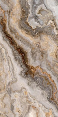 an abstract marble pattern with brown, white and grey colors on it's surface