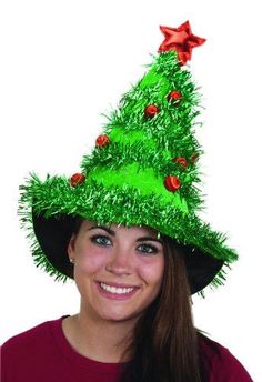 These Christmas Tree Hats are perfect for holiday parties, corporate events, office parties, community events, family parties, Christmas in July, elves, parades or breakfast with Santa. Decorated with green tinsel garland, lame ornaments and red star on the top of a hat. Hat is made of felt. Sold individually. Other Christmas costumes and accessories are sold separately on our page – subject to availability. One size fits most larger children, teens and adults. One size fits most larger children Christmas Costumes For Adults, Funny Christmas Hats, Christmas Tree Costume, Light Up Hats, Tree Hat, Tree Costume, Green Tinsel, Christmas Tree Hat, Tacky Christmas