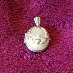 This 14kt Solid Yellow Gold Irish Claddaugh Locket Is 3/4 Inch Wide By 7/8" High. Beautiful Pristine Locket With The Inner Frames And Photo Guards Intact. Never Used. See Photo For Gold Marking On The Bale. Comes With An 18 Inch 1/20th 12kt Gold Chain And The Original Velvet Necklace Box From The Museum Company. ( If You Do Not Want The Chain And Box, The Price Will Be Reduced By $10. Please State Your Preference In Your Offer) Velvet Necklace, Necklace Box, 14kt Gold, Solid Yellow, Gold Chain, Locket, Gold Chains, Womens Jewelry Necklace, 4 Inch