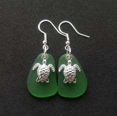 "Aloha! These design shows my love for this beautiful island of Hawaii. This item will be made to order and shipped directly from Hawaii. This is sea glass earrings with silver hooks. This handmade in Hawaii jewelry gift is from cultured sea glass that are specially formed into its shape for jewelry making. Each comes with a gift box with \"handmade by yinahawaii\" stamp and a ribbon wrapped as shown in the 2nd photo, ready to give as gift. I also offer Free gift messaging with the order. Please Green Dangle Jewelry For The Beach, Handmade Sea Glass Dangle Jewelry, Handmade Dangle Sea Glass Jewelry, Green Sea Glass Earrings For Gift, Green Jewelry With Matching Earrings For The Beach, Sea Glass Dangle Earrings Jewelry Set, Sea Glass Dangle Earrings With Matching Set, Silver Sea Glass Earrings For Beach, Green Recycled Glass Earrings For Beach