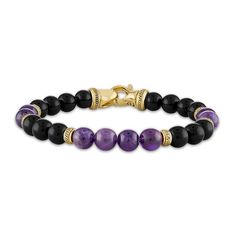 Mesmerizing natural amethyst beads are separated by dazzling natural onyx beads and 14K gold-plated sterling silver accents in this handsome men's bracelet. Fashioned in 14K gold-plated sterling silver, the 8.75-inch men's bracelet secures in place with a lobster clasp. The signature "E" is stamped on the clasp to identify each piece as part of the 1933 by Esquire men's collection. Jared The Galleria Of Jewelry, Men's Bracelet, Onyx Bead, Amethyst Bracelet, Amethyst Beads, Bracelet Clasps, Silver Accents, Amethyst Stone, Gemstone Bracelets