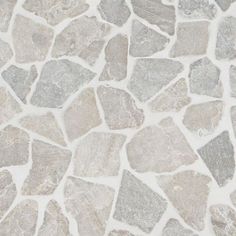 a stone floor with grey and white colors