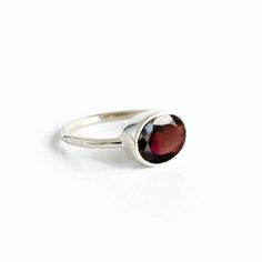 Click ⬆PERSONALIZE IT to see how your ring will look! You'll fall in love with the deep red coloring of this Garnet Quartz ring. This is a perfectly sized oval to compliment any collection. Popular as a birthday gift for those January babes and Garnet lovers alike. This is a dark, transparent red gemstone with no flaws. This stone is beautifully faceted and bezel set in a 925 sterling silver band or plated with 18k vermeil gold. Minimalist Red Oval Rings, Oval Garnet Rings As Gift, Oval Garnet Ring For Gift, Red Oval Stackable Promise Rings, Red Gemstones, January Birthstone, Garnet Ring, Oval Rings, Quartz Ring