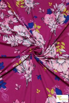 a pink floral print fabric with blue and yellow flowers