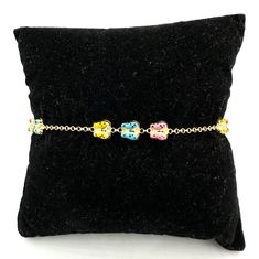 Vintage 80s Italian girl's bracelet in solid 18k yellow gold, professionally tested and with 750 hallmark, with multicolored enamel butterflies. Length including closure 18 centimetres. Butterfly dimensions 0.5 x 0.6. Mesh width 0.4 centimetres. Weight 4.8 grams. Sold with packaging from our jewelers, guarantee and tax receipt. Bracelet Vintage, Favorite Jewelry, Jewelry Bracelets, Charm Bracelet, Bathing Beauties, Yellow Gold, Electronic Accessories, Purses And Bags, Bracelet