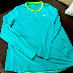 This Is A Great Sporty, Long Sleeve Nike Three-Quarter Zip. It’s Brand New Never Been Worn Very Lightweight. You Can Wear This Almost Anywhere. It’s A Great Looking Shirt Green Stretch Long Sleeve Shirt, Green Sporty Long Sleeve Top, Sporty Yellow Long Sleeve Top, Sporty Long Sleeve Yellow Top, Yellow Long Sleeve Sporty Top, Nike Green Long Sleeve Tops, Yellow Sports Top For Spring, Nike Long Sleeve Shirt, Nike Long Sleeve