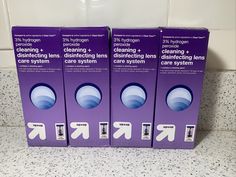 three boxes of cleaning and disinfecting hygiene products