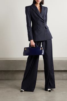 EXCLUSIVE AT NET-A-PORTER. Alex Perry re-imagines the classic pinstriped blazer with a glamorous twist. Flecked with lustrous silver threads that sparkle in the light, this double-breasted style is made from navy twill and has padded shoulders contrasted by a nipped-in waist. Wear yours with the coordinating pants. Elegant Double-breasted Pinstripe Blazer, Elegant Pinstripe Double-breasted Blazer, Luxury Striped Blazer For Workwear, Chic Striped Suits With Notch Lapel, Chic Striped Notch Lapel Suit, Luxury Pinstripe Blazer For Office, Chic Striped Business Suits, Chic Striped Suits For Office, Chic Pinstripe Suits With Notch Lapel