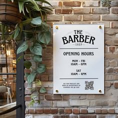 a sign on the side of a building that says the barber opening hours are now available