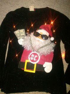 a santa clause sweater with sunglasses and money on it