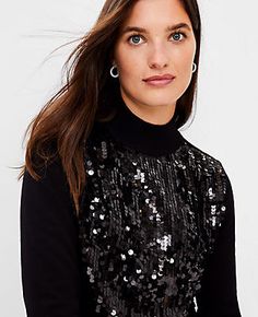 Elevate your wardrobe with the Ann Taylor Sequin Front Turtleneck Sweater, a piece that combines elegance with a touch of sparkle. Perfect for those who love to stand out, this sweater features a dazzling sequin front that catches the light beautifully.

- Size: 2XS
- Color: Black
- Gender: Female
- Material: Knit - 53% Viscose, 47% Nylon; Front - 96% Polyester, 4% Spandex; Lining - 100% Polyester
- Fit: Softly fitted
- Length: 23 1/2" long
- Care Instructions: Machine washable

This turtleneck Winter Contrast Sequin Tops, Winter Tops With Contrast Sequin, Sequin Turtleneck, Petite Sweaters, Knitted Suit, Double Knitting, Black Sequins, Turtleneck Sweater, Black Sweaters