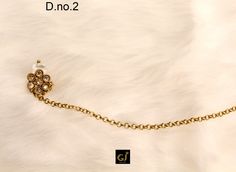 Indian non pierced clip on nose pin nose ring nath chain for bridal wedding. Hoop size (Diameter) : D.no. 1= 0.4 inch (Diameter) D.no. 2= 0.4 inch (Diameter) D.no. 3= 0.5 inch (Diameter) D.no. 5= 0.4 inch (Diameter) Gold Nose Rings For Wedding Festivities, Festive Elegant Gold Nose Rings, Elegant Gold Ceremonial Nose Ring, Elegant Ceremonial Gold Nose Rings, Tilla Nose Rings For Wedding Festivities, Elegant Chandbali Nose Rings For Wedding, Elegant Gold Nose Rings For Wedding, Festive Wedding Nose Ring With Tilla, Gold Bollywood Nose Rings For Wedding