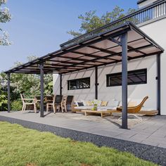 an outdoor living area with patio furniture under a pergolated roof