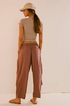 Breezy and effortless, these timeless pants from free-est are a true seasonless staple. **Fit:** Mid-rise, relaxed harem fit **Features:** Pull-on design, drawstring closure, dropped pouch pockets, tucked pleating seam **Why We ❤ It:** Off-duty with your favorite tee or perfectly paired with the matching skirt, this pair has endless ways to wear. | Take Me With You Linen Pants by free-est at Free People in Brown, Size: M Brown Linen Pants, Linen Pants Women, Boho Clothing, Linen Pants, Boho Outfits, New Outfits, Fashion Inspo Outfits, Style Me, Mid Rise