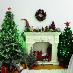 christmas trees and presents in front of a fireplace