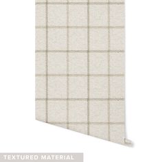 the textured material is made from white and beige fabric with a checkered pattern