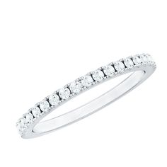 a white gold wedding band with round diamonds