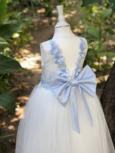 Beautiful off white flower girl dress with 3D flowers with multilayered skirt,satin and bodice with zipper. Welcome to my Shop: https://www.etsy.com/shop/MagicDressesByGM I can create something uniquely for you! I created the crown of flowers specifically for the blush dress that you can find in my store    Crown of flowers: https://www.etsy.com/listing/675103755/blush-flower-girl-crown-pink-flower?ref=shop_home_active_1 I used the same flowers as on the dress. I think this crown of flowers will be a great addition to your look Item material:  upper layer of the skirt- tulle  middle layer of the skirt- tulle lower layer of the skirt- taffeta corset- satin with 3D dlowers, zipper, button, and lacing. Item color: off white. Size: 1 -2-3-4-5-6-7-8-9-10-11-12 The size chart is the picture of t Dusty Blue Flower Girl Dress, Dusty Blue Flower Girl, Blue Flower Girl Dress, Blue Flower Girl, Lace Top Wedding Dress, Ivory Flower Girl Dress, Blush Flower Girl Dresses, Dusty Pink Dresses, Flower Girl Dresses Blue