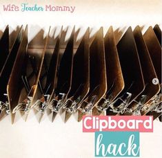 the clipboard hacker is hanging on the wall with clothes pins attached to it