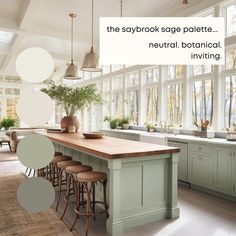 an image of a kitchen with green cabinets and wood counter tops in shades of gray