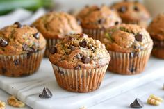 chocolate chip muffins on a white tray