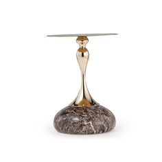 a small table with a marble top and gold accents on the base, it has a circular