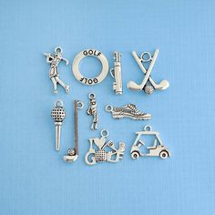 Golf themed collection of antique silver tone charms, in a zinc alloy metal. Perfect for bracelets, pendants, earrings, zipper pulls, bookmarks and key chains! Measurements: 10mm - 30mm Hole Size: 2mm You will receive 1 set of 10 charms. PLEASE NOTE: From time to time I may need to substitute one of the charms for another of equal or greater value... all keeping with the theme of the collection. Need more? Just send us a message through the contact us form, instant chat, or at mailto:info@bohemi Nickel Free Silver Themed Charms, Themed Sterling Silver Charms, Themed Silver Metal Charms, Themed Silver Sterling Charms, Personalized Silver Metal Charms, Nickel-free Themed Silver Charms, Metal Dangling Charms For Collectibles, Antique Silver Metal Charms For Gifts, Silver Novelty Charm Necklace