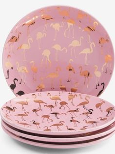 pink flamingo plates with gold foil on them