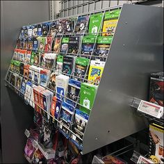 there are many magazines on display in the store