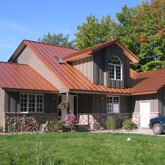 a car is parked in front of a house with a red border around it and an image of the home