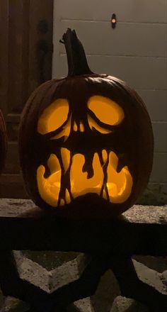 a carved pumpkin sitting on top of a table