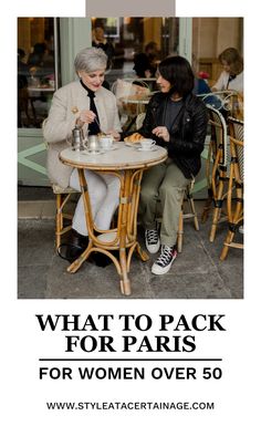 two women sitting at a table with food in front of them and the words, what to pack for paris for women over 50