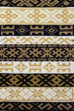 four different types of beaded bracelets are shown in this close up photo, one is gold and the other is black