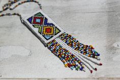 SUMMER SALE Ethnic Beaded Necklace Colorful by HeriniaJewelry Bohemian Rectangular Beaded Necklace, Bohemian Rectangular Beaded Necklaces For Festivals, Bohemian Rectangular Necklaces With Colorful Beads, Bohemian Rectangular Beaded Necklaces, Bohemian Multicolor Pendant Beaded Necklaces, Traditional Beaded Rectangular Necklaces, Bohemian Multicolor Rectangular Beaded Necklaces, Multicolor Rectangular Bohemian Beaded Necklaces, Traditional Beaded Rectangular Necklace