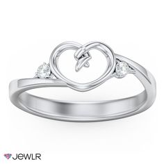 a white gold heart shaped ring with three diamonds on the side and two hearts in the middle