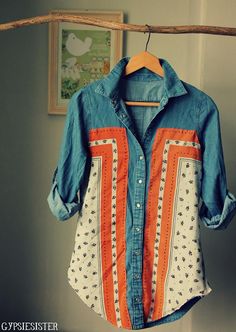 an orange and white shirt hanging on a clothes line