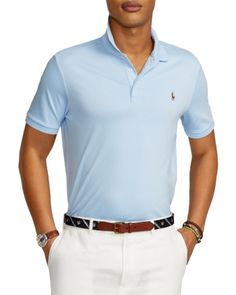 Ralph Lauren debuted his original Polo shirt in 1972, and today the iconic design is offered in a wide array of colors and fits. This heathered version is made from smooth cotton interlock and cut for a roomy silhouette. Cotton Polo Shirt, Menswear Collection, Cotton Polo, Classic American, Heritage Brands, Polo Collar, Polo Ralph Lauren Mens, Mens Polo Shirts, Signature Style