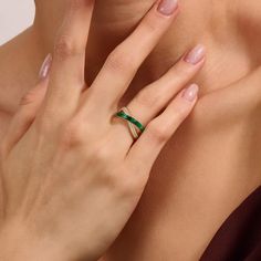 Introducing our Green Enamel X Ring, a bold and modern expression of style. This sleek piece features a bold X-shaped design complemented by a striking green enamel accent that adds a pop of color to the chic simplicity of the design. Whether worn as a standalone statement or stacked with other favorites, it is a symbol of understated style and a must-have addition for those who appreciate bold, yet refined style. - Made in 14k solid gold - Decorated with handset white cubic zirconia stone - Fin Elegant Green Enamel Ring, Modern Green Emerald Ring For Formal Occasions, Modern Green Jewelry For Formal Occasions, Modern Formal Green Emerald Ring, Elegant Green Enamel Ring As A Gift, Elegant Green Enamel Ring For Gift, Elegant Green Enamel Ring Gift, Modern Green Enamel Jewelry, Green Enamel Ring