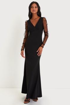 Cameras will flash as you stroll in looking incredible in the Lulus Red Carpet Energy Black Tulle Long Sleeve Mermaid Maxi Dress! Stretchy techno crepe knit fabric shapes a bodice with a V-neckline, V-back, and gathered cups. Sheer tulle overlays the cups, continuing into sheer ruched sleeves with gathering at the shoulders. Skirt has a figure-hugging, mermaid silhouette that falls to a sweeping maxi hem. Hidden zipper/clasp at back. Fit: This garment fits true to size. Length: Floor length. Size medium measures 59.5" from shoulder to hem. Bust: Great for any cup size. Waist: Fitted - very fitted at natural waist. Hip: Loosely Fitted. Undergarments: May be worn with an adhesive bra, petals, or no bra. Fabric: Fabric is very stretchy. Shell: 95% Polyester, 5% Spandex. Lining: 100% Polyester Red Carpet Dresses Long, Black Long Sleeve Prom Dress, Long Sleeve Black Maxi Dress, Winter Bridesmaid Dresses, Mermaid Maxi Dress, Bridal Party Attire, Bridesmaid Dresses With Sleeves, Tulle Maxi Dress, Black Tie Dress