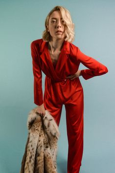 The upper part of the red jumpsuits is a long sleeve shirt with two buttons at the front and wide leg pants at the lower part. Perfect for night out in the town. Featured in REFINERY29 "10 No-Brainer Jumpsuits That Make The Perfect One-Piece Outfit" This sustainable jumpsuit is tailor made and on demand. PLEASE ALLOW 1-3 BUSINESS DAYS FOR PRODUCTION Red Jumpsuit For Workwear In Fall, Red Jumpsuits And Rompers For Work In Fall, Red Jumpsuit For Work In Fall, Red Long Sleeve Jumpsuits And Rompers For Fall, Chic Long Sleeve Pantsuit For Party, Elegant Red Long Sleeve Jumpsuit, Chic Evening Jumpsuits And Rompers For Winter, Fall Party Pantsuit With Long Sleeves, Long Sleeve Pantsuit For Fall Party