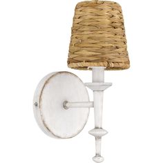 a white wall light with a woven shade on it's side and a wooden arm